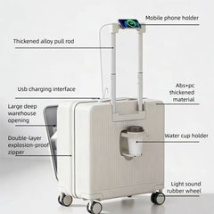 A white hard-shell rolling suitcase with an extended handle, shown with multiple callout labels pointing to features such as a mobile phone holder, USB charging interface, water cup holder, and thickened alloy pull rod on a light gray studio background.